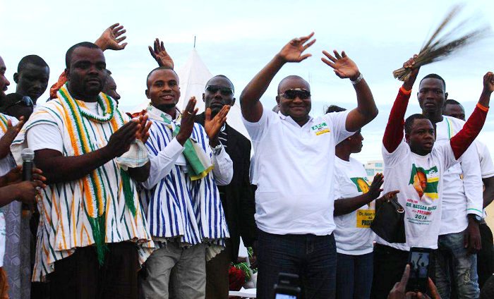 Mr Ayariga (middle) waving to his supporters